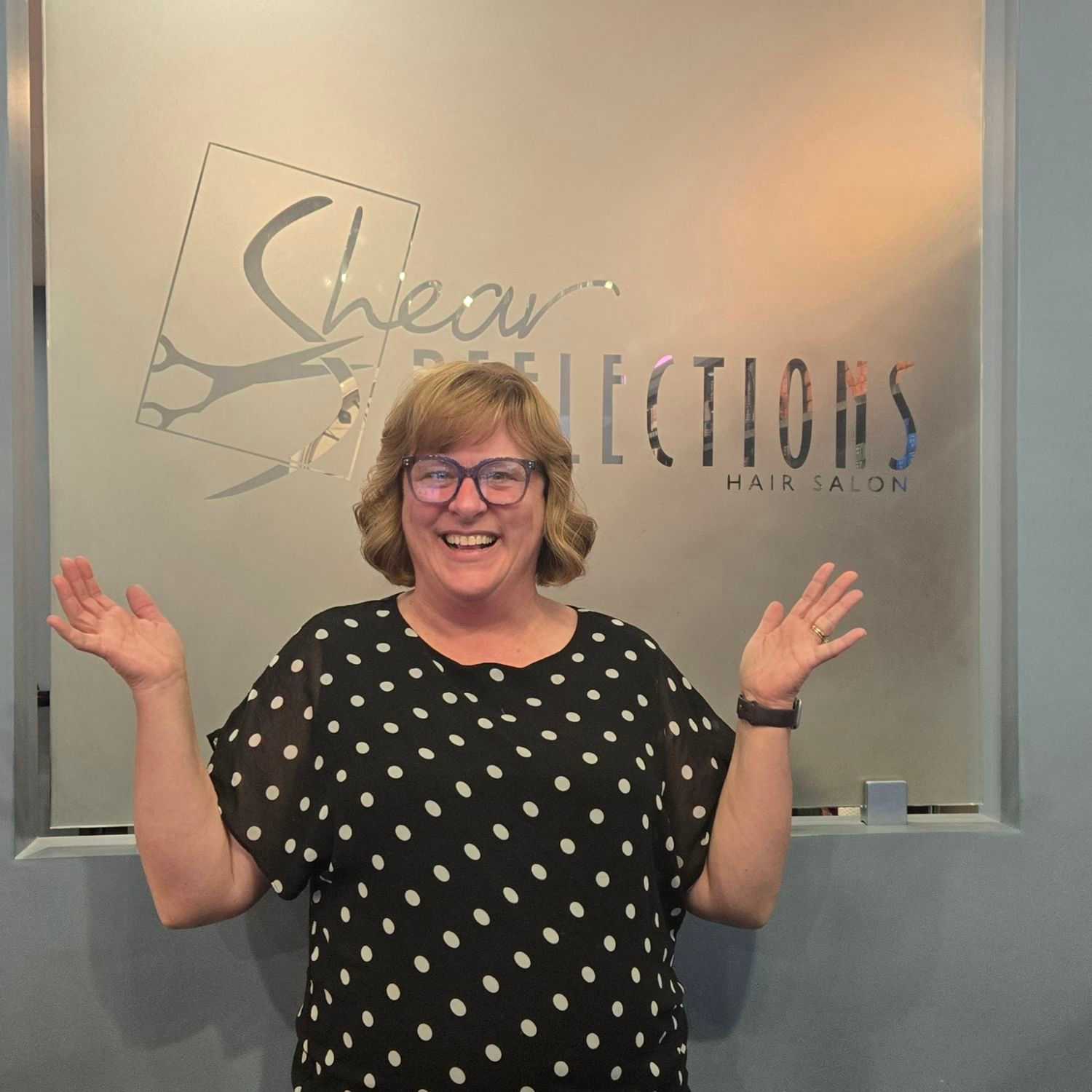 Portrait of Renee, a professional stylist at Shear Reflections Hair Salon, showcasing their expertise and style.