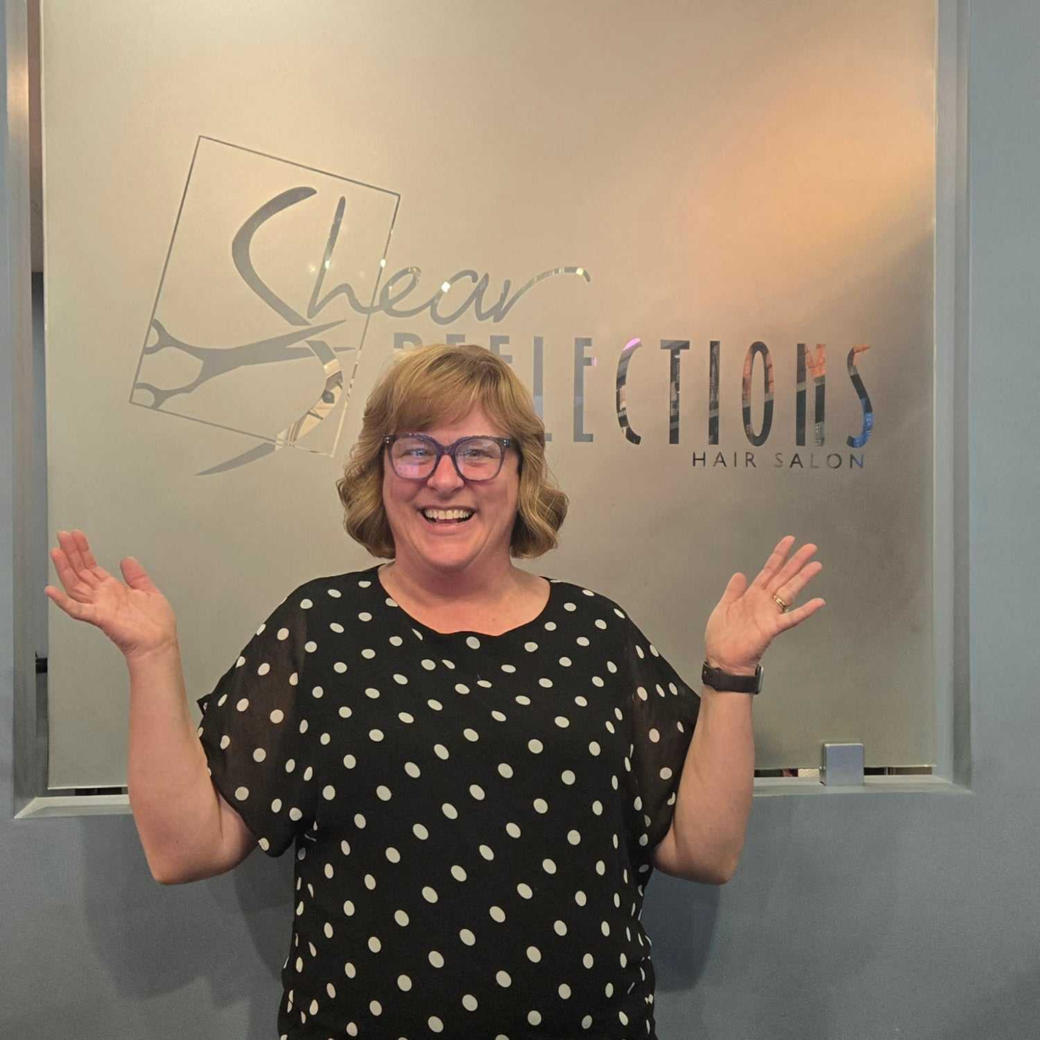 Portrait of Renee, a professional stylist at Shear Reflections Hair Salon, showcasing their expertise and style.