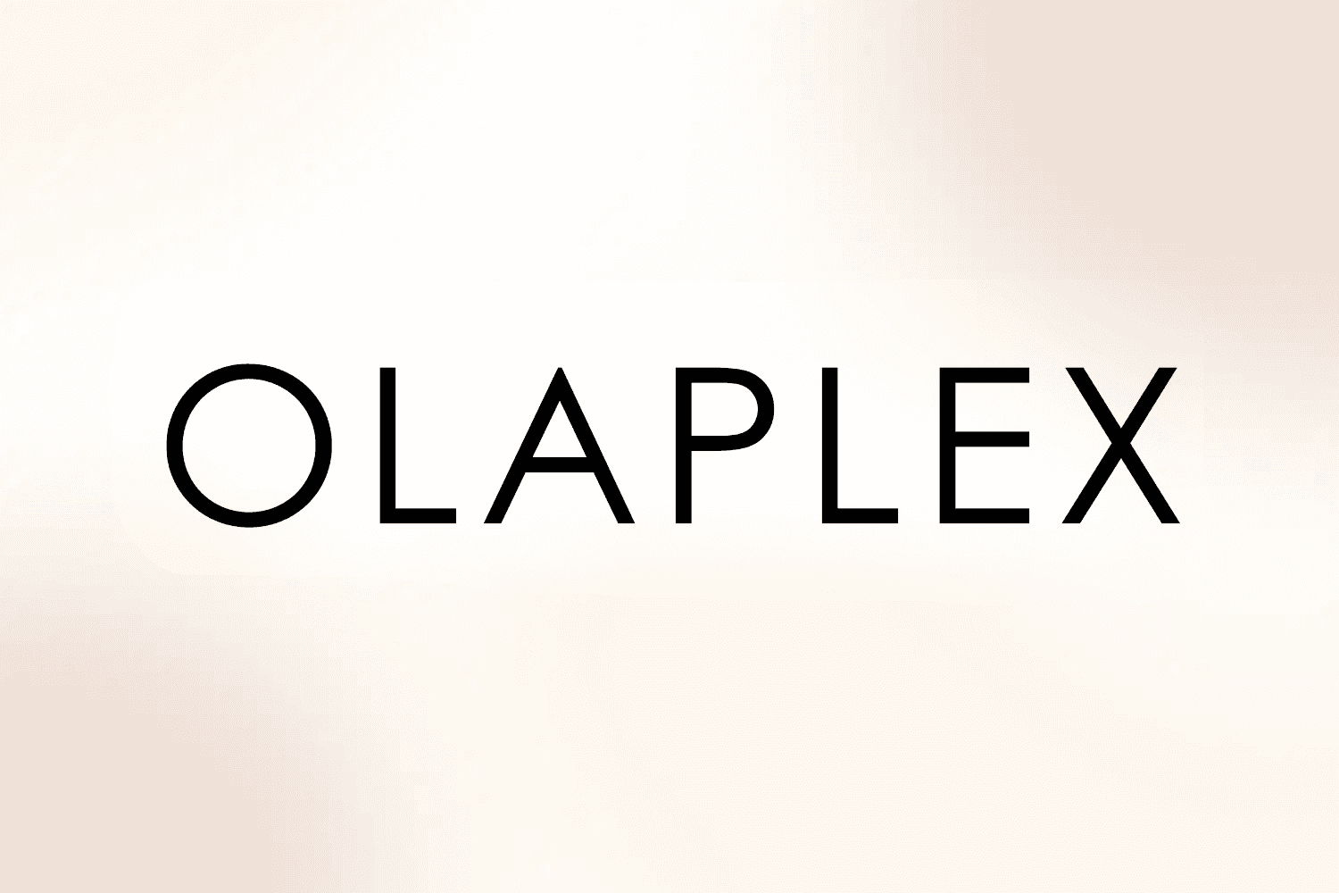 Logo of Olaplex displayed on a soft beige background.